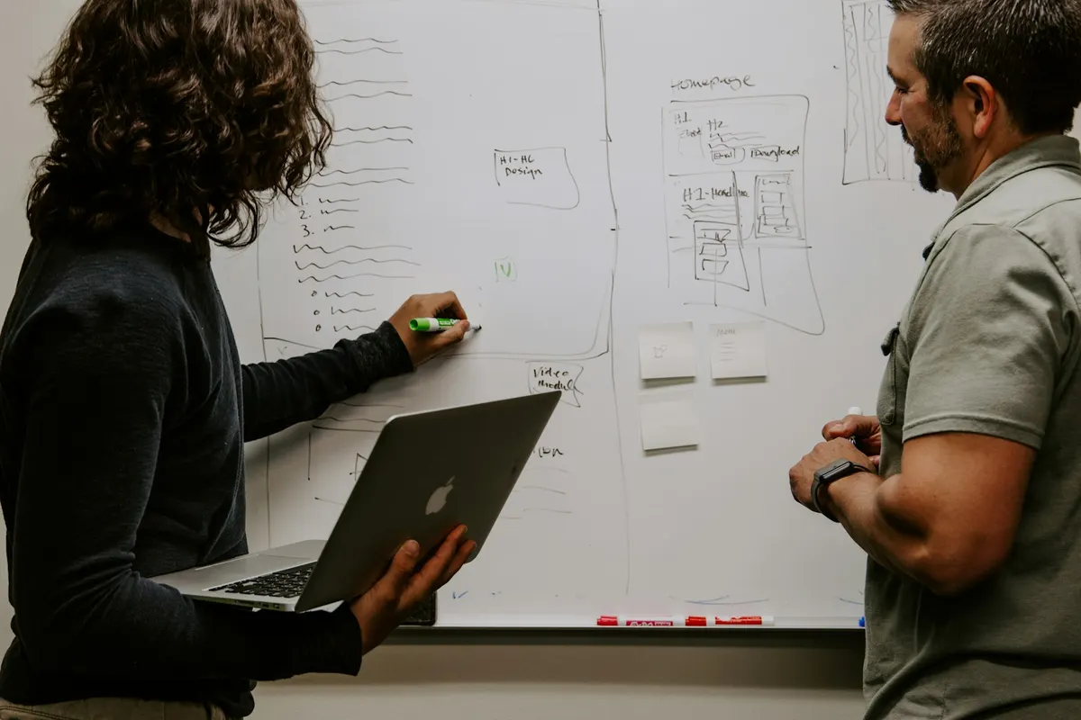 Team mapping a data platform modernisation on a whiteboard